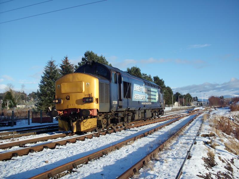 37218 Kingussie: 37218 at Kingussie with 0Z99 1100 Inverness - Dunkeld - Inverness on the 08/01/11. Photo of 37218 Kingussie