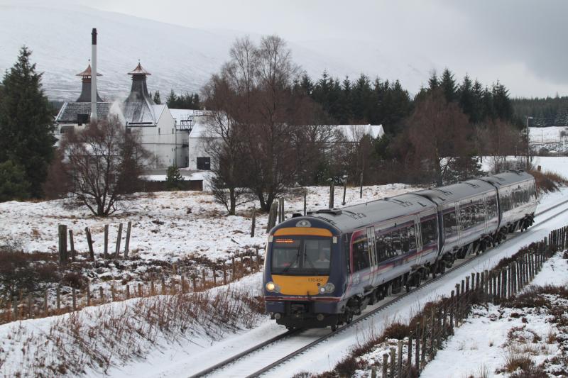 170 at Dalwhinnie: 170454 heads north past the Dalwhinnie whisky distillery on 10 January 2011 Photo of 170 at Dalwhinnie