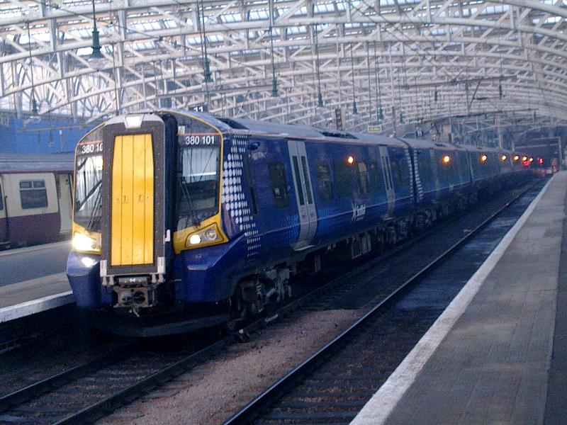380101: ScotRai's new Desiro Class 380s are continuing to enter service, although not in large numbers. Here 4 Car 38010l leads 3 car 380003 with the 1530 departure from Glasgow Central to Ayr on Thuesday 20th January 2011. Photo of 380101