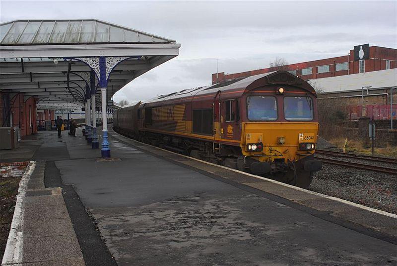 66041 at Kilmarnock station at 25-1-11: DBS 66041 heads south on 4S90 at 12.00 on 25-1-11. Photo courtesy of Ian Millar Photo of 66041 at Kilmarnock station at 25-1-11