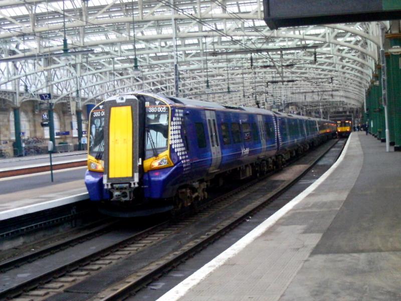 380005: With more 380s now being accepted, passenger carrying services have recently increased.Here 3 car 380005 leads 4 car 380104 at Glasgow Central with 2K33 the 1530 to Ayr.The scene date is Friday 11th February 2011 Photo of 380005