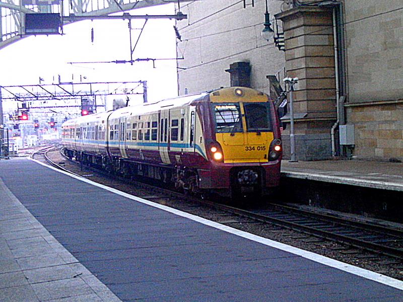 334015: Shortly to be a thing of the past at Glasgow Central. SPT Liveried 334015 arrives at Glagow Central with a service from Gourock on Friday 11th February 2011. Photo of 334015