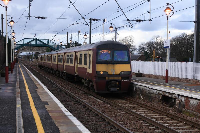 5Z20 at Drem: 320314 slowing down for the loop at Drem on the 10.30 Shields Depot to Doncaster West Yard on 14/02/2011. Station lights were receiving attention. Photo of 5Z20 at Drem