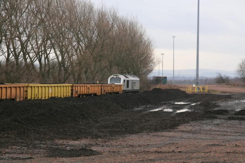 67029 on 6E49: 67029 shunting loaded JNA wagons ( Used Ballast from the stockpile ) for 6E49 Millerhill to Whitemoor. The Millerhill spent Ballast has nearly been cleared on 22/02/2011 Photo of 67029 on 6E49
