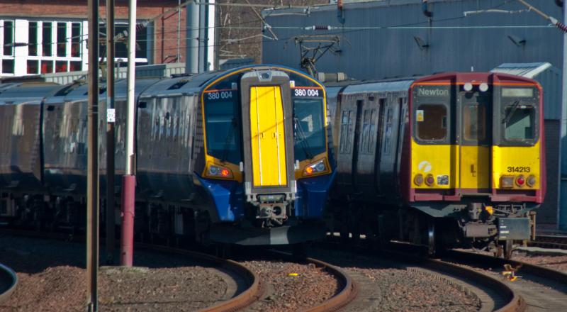 Old & New: Brand New 380004 (Before the 380's enter service) & OLD 314213 Sit together on Corkerhill Depot Sat 26th Feb 2011 Photo of Old & New