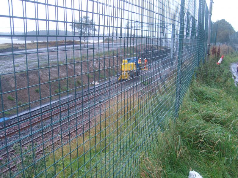 Near the fishing club: A 5pm on a wet Saturday the catenary team are still busy Photo of Near the fishing club