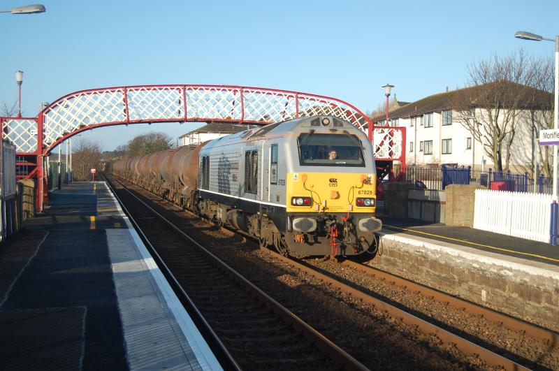 Diamond tanks: Working 6A31 Mossend - Aberdeen Waterloo, 67029 makes a nice change from the usual traction as it heads through a sunny but windy Monifieth. 10/3/11 Photo of Diamond tanks