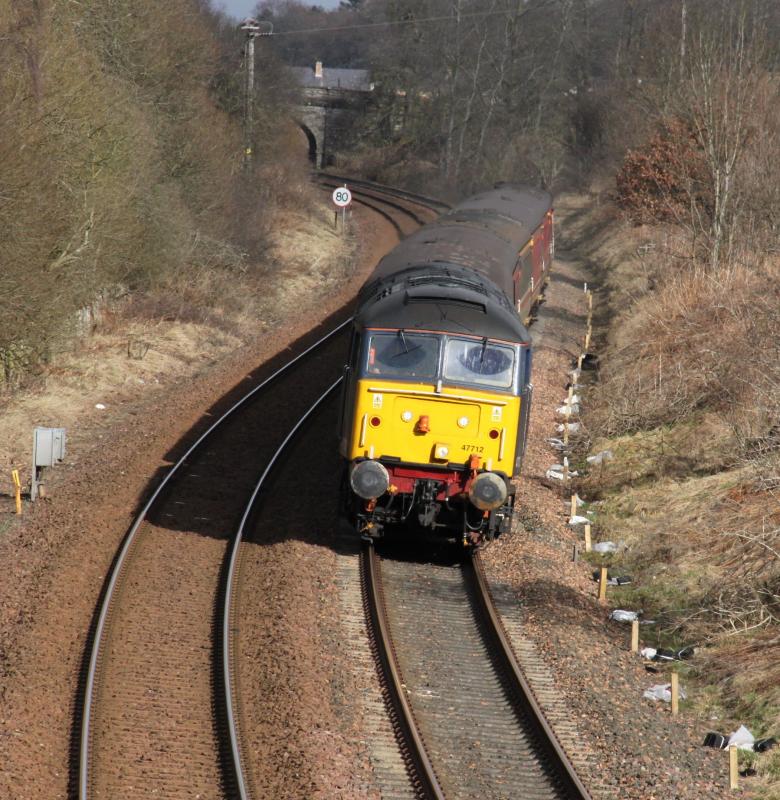 DRS 47712: DRS 47712 rounds the curve at Demarkfield farm, today see only the one loco as 47802 had flat batteries. 5Z71 Inverness - Perth on 9/3/11 driver/route knowledge training Photo of DRS 47712