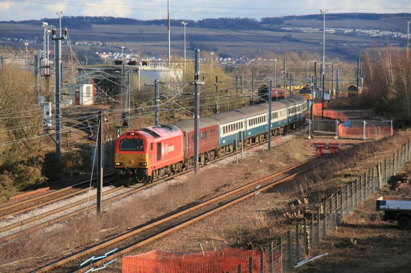 67018 on 5G13: 67018 leaving Millerhill on 5G13 16.28 Millerhill to Waverley on 22/03/2011. 57003 + 57004 on 6M50 Uid 66 on 6X88 Photo of 67018 on 5G13