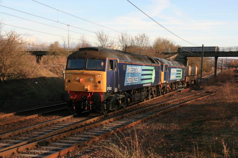 6M50: 57003 leads 57004 on 6M50 15.07 Torness to Carlisle on 22/03/2011. 6M50 must have left early to go via Grantshouse loops as it is not topn tailed. Photo of 6M50