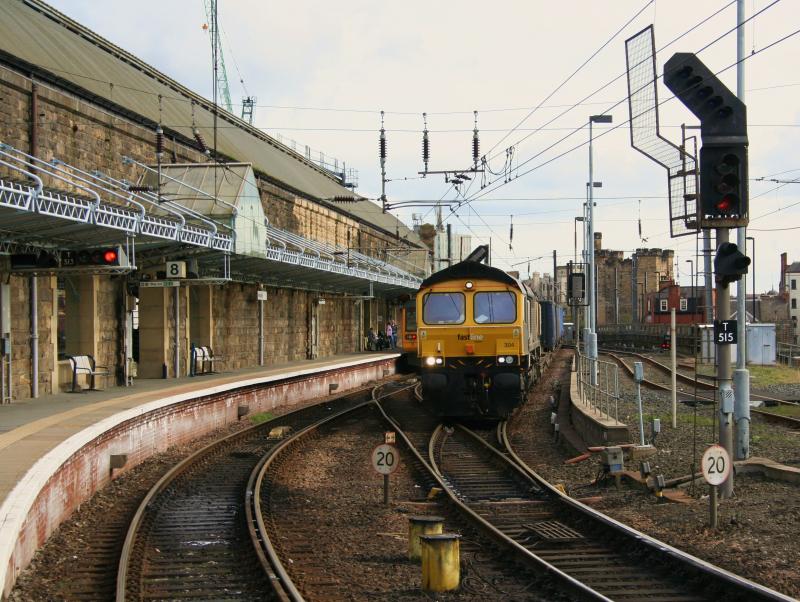 66304 4M16 Newcastle:
Ex Fastline 66304 makes a debut for the sub class at Newcastle on 2nd April 2011 while working 4M16 Grangemouth to Daventry which was diverted due to engineering works on the WCML Photo of 66304 4M16 Newcastle