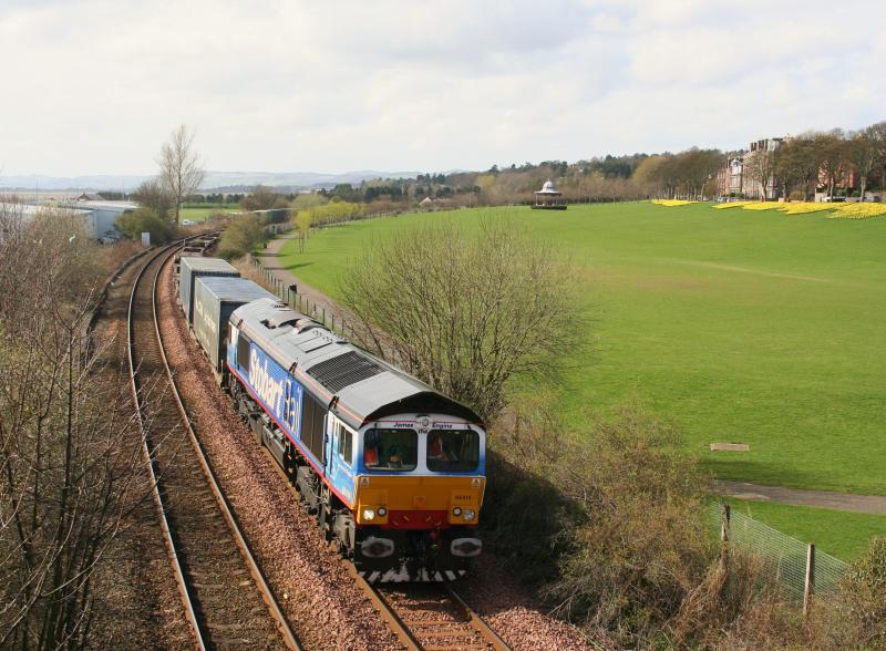 Stobart Rail 66414 4A13 approaches Dundee:
Stobart Rail 66414 'James The Engine' approaches Dundee while working the 4A13 Grangemouth to Aberdeen inter-mostly-empty-model on 5th April 2011 Photo of Stobart Rail 66414 4A13 approaches Dundee
