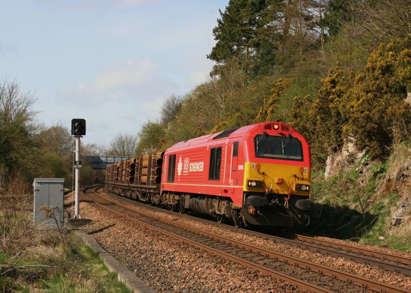 67018 6Z03 Mossend to Dyce Raiths Farm: 67018 in DB Schenker pink/red works 6Z03 Mossend to Dyce Raiths Farm on the approach to Dundee on the 5th April 2011 Photo of 67018 6Z03 Mossend to Dyce Raiths Farm