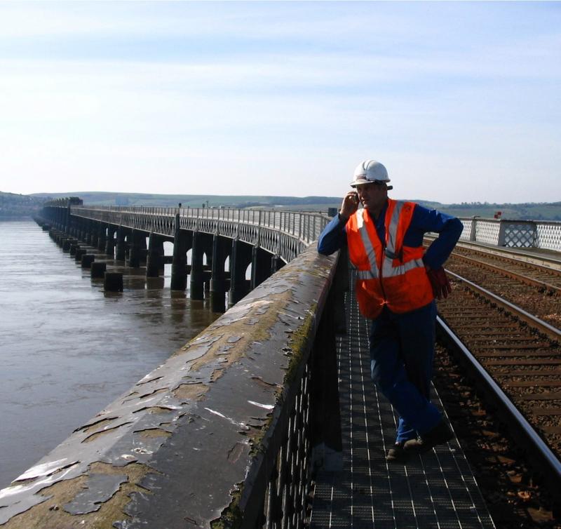 Clive.jpg: Life on the railway!
Sometimes working on the railway has it's benefits - a member of Network Rail staff enjoys the view from the Tay Bridge in Summer 2005. Photo of Clive.jpg