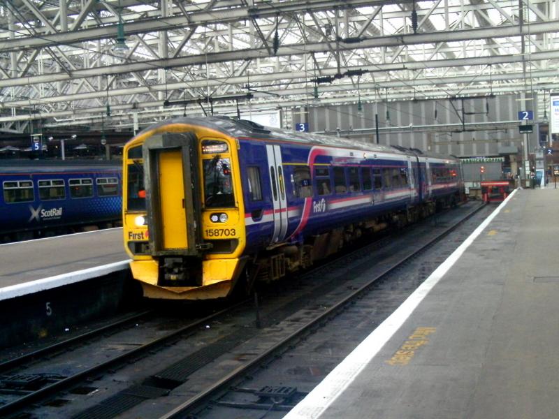 158703: 158703 waits to leave Glasgow Central with the 1448 service to Whifflet on Wednesday 6th Aperil 2011 Photo of 158703