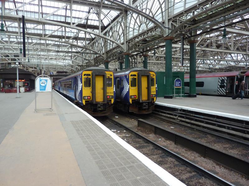 156507: 156507 and 156512 awaiting their next services in Glasgow Central. 7 Mar 2011. Photo of 156507