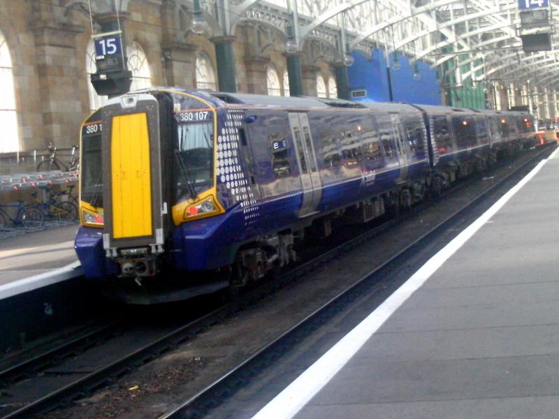 380107: With more 380s now being accepted by ScotRail, diagrams have expanded. Here 380107 is seen at Glasgow Central on Saturday 9th April 2011. Forming the 1618 departure to Largs. Photo of 380107