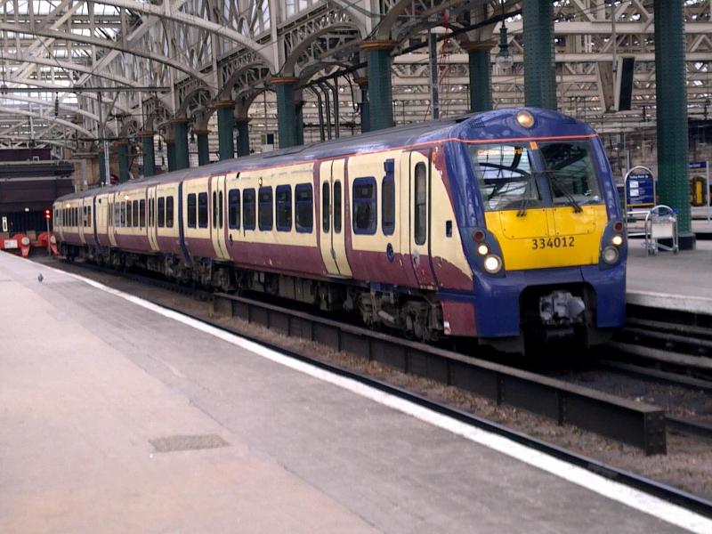 334012: One of the elusive Saltire liveried 334012, arrives at Haymarket with the 1210 dervice from Helensburgh Central on Saturday 9th April 2011. Photo of 334012