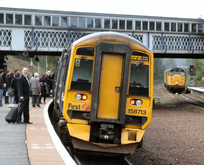 Some you win...: 37001 boards the Edinburgh train as 2Q88 to Inverness creeps into the station. Photo of Some you win...