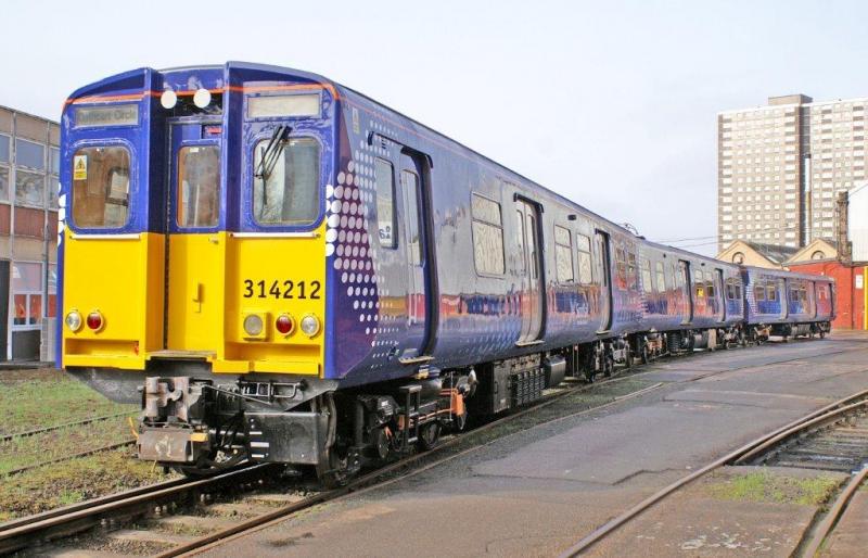314212: Ex Works 314212 stands outside the test house on a sunny early morning prior to departure on 9th April
Photo with permission of Railcare & FirstScotrail Photo of 314212