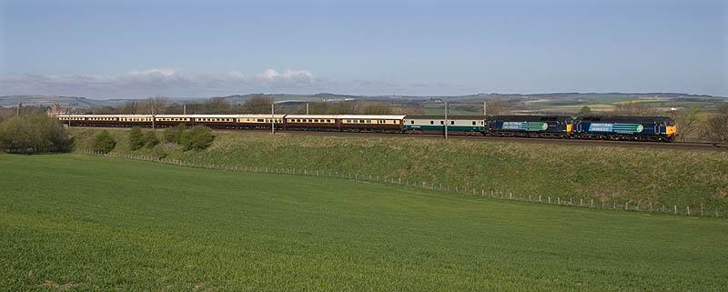 1Z18 at Burnmouth: DRS Class 47's - 47790 and 47832 pictured having just crossed Henderson's Bridge near Burnmouth on the morning of 12th April 2011. The locos were working the 1Z18 Edinburgh-York-London Victoria. Photo of 1Z18 at Burnmouth