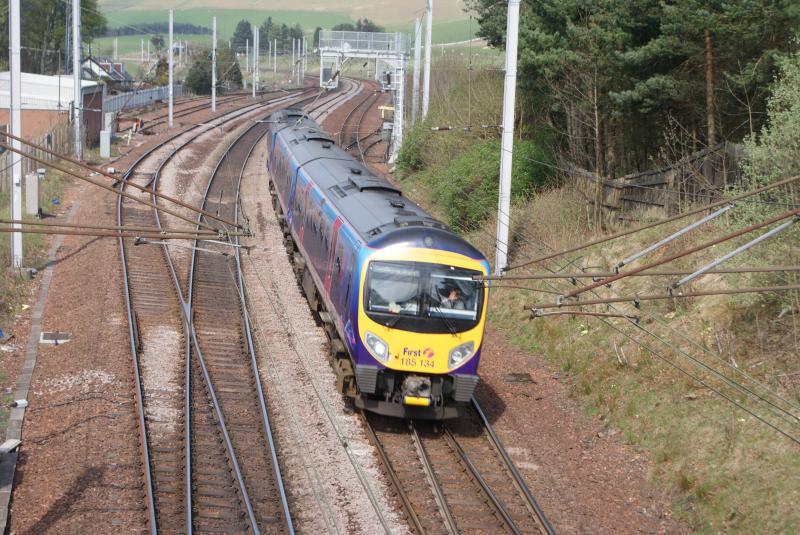 Abington Loop: I receive a wave from the driver of this First Trans-Pennine Express 185 DMU as he rushes past Abington Loop on the upline. Photo of Abington Loop