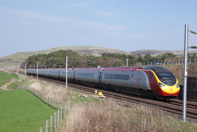 Sprinting Towards Abington: This upline 9-car 390 Pendolino rushes towards Abington in rural South Lanarkshire , with the A702 above. Photo of Sprinting Towards Abington