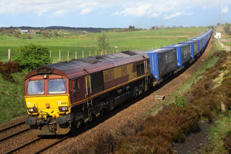 4S43: 66083 - 4s43 tesco seen here approaching fauldhouse With late Rugby - Mossend diverted via ecml due to engineering works. Saturday 23/4/2011 @ 16:44 Photo of 4S43