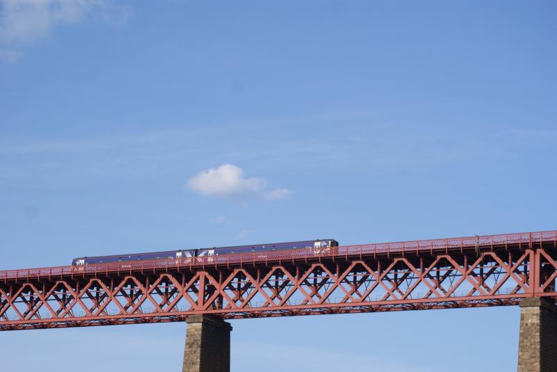 'Spotrail' 158: Two-car 158 in 'Spotrail' livery trundles over the Forth Bridge on a sunny Easter Monday evening. Photo of 'Spotrail' 158