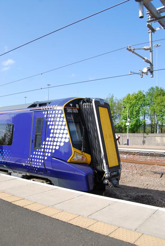 380009 at Cardonald: 380009 on a GC- Gourock Stopping service calls at Cardonald Station.
This is a real picture but because of the light almost looks like the Photo of 380009 at Cardonald