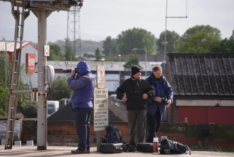 Gaggle of Snappers: At the platform edge in Carlisle Citadel , these snappers prepare themselves to photograph incoming trains from the south. Photo of Gaggle of Snappers