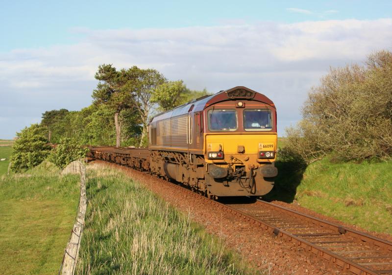 66099 at Crackaig 6E69 18/05/11:
66099 passes Crackaig between Helmsdale and Brora with 6E69 Georgemas Junction to Tees Yard empty pipe carriers and spacer wagons on 18th May 2011 Photo of 66099 at Crackaig 6E69 18/05/11