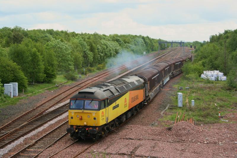 47739 4Z47 Cadder 11/05/11:
47739 departs Cadder yard with more stored KSA cube wagons for Hamilton Works on 11th May 2011 Photo of 47739 4Z47 Cadder 11/05/11