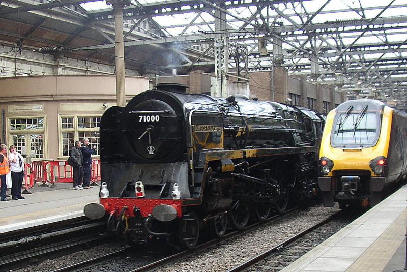 The Duke at Waverley: 71000 retreats from Edinburgh Waverley, passing the cross country Penzance service. Photo of The Duke at Waverley