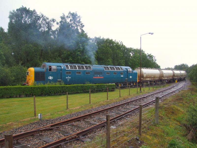55022 and 6E45 at Fort William: 55022 propels 6E45 onto the Mainline at Fort William during torrential rain. Photo of 55022 and 6E45 at Fort William