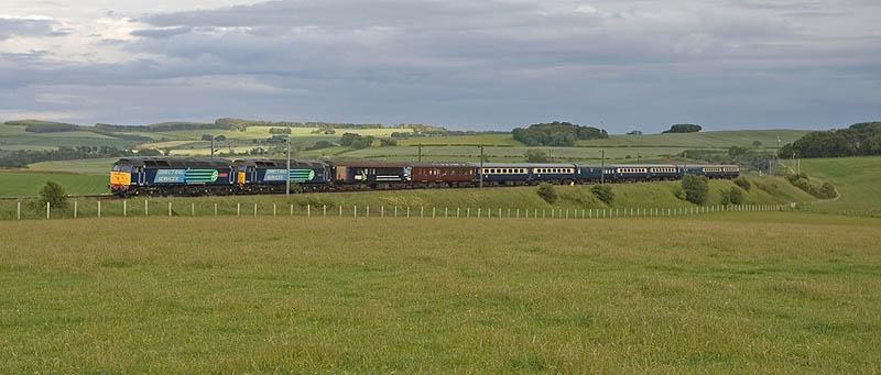 1Z52 at Reston Hill: Running some five minutes early at Reston Hill, 47810 and 47501 were a fine sight as they rounded the corner from Prenderguest with the 1Z52 Southampton Docks to Edinburgh earier tonight. Photo of 1Z52 at Reston Hill