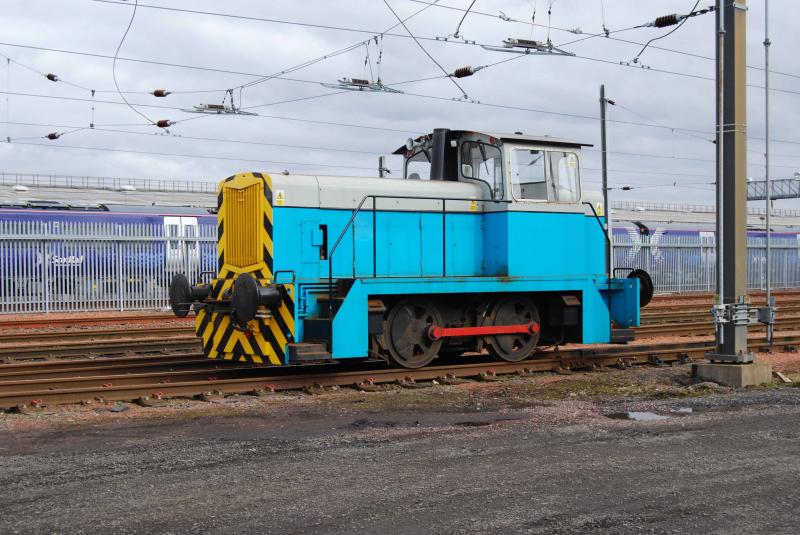 Polmadie Shunter: 0-4-0 Shunter Sits on PO Sat 19th Mar 2011
It had been shunting some of the new 380's around to clear space for the nex 2 units to arrive at the beginning of the week Photo of Polmadie Shunter
