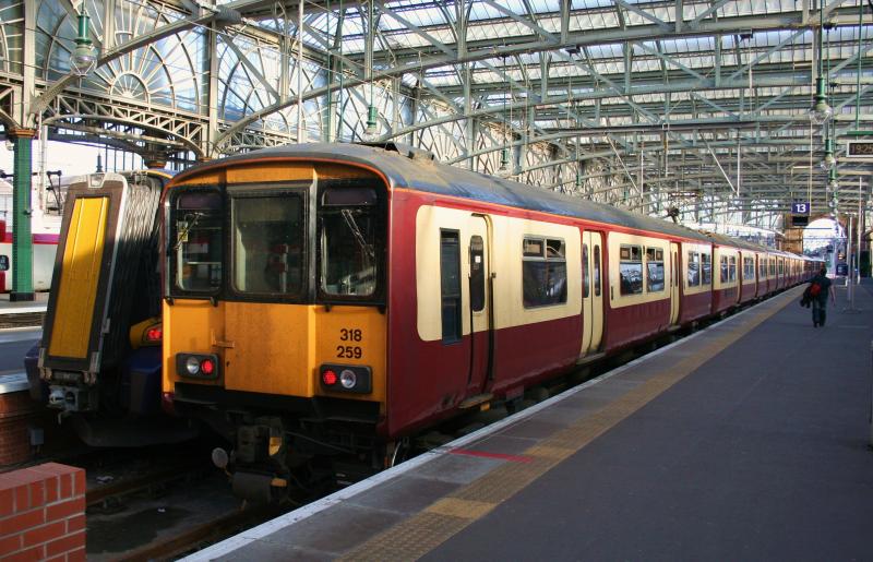 318259 Glasgow Central 030711:
318259 stands in platform 13 at Glasgow Central on 2nd July 2011, the penultimate day for 318's working Ayrshire and Inverclyde services Photo of 318259 Glasgow Central 030711