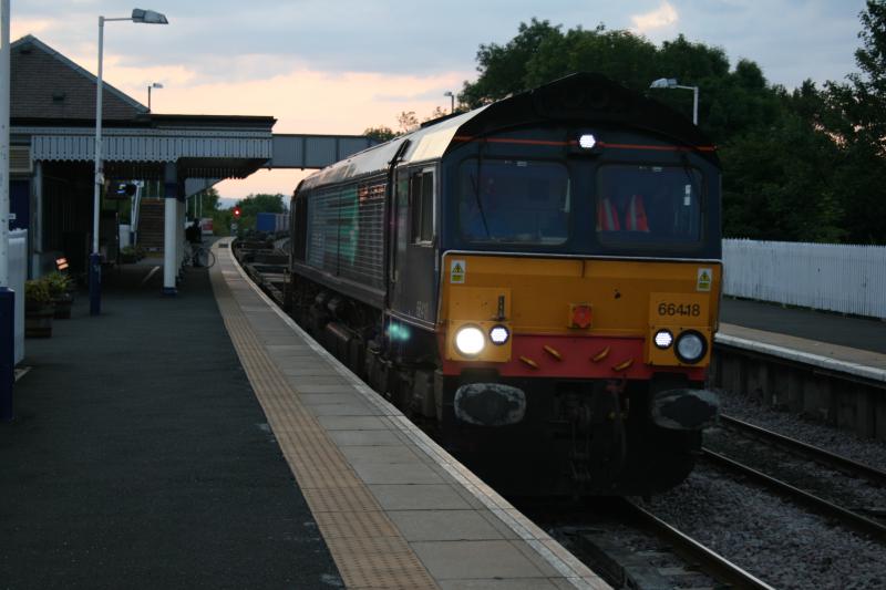 DRS 66 at Dalmeny with intermodal: Bridge work at Camelon 3 July 2011 forced the diversion of 4M30 from Grangemouth to Daventry via Dalmeny. Here setting off south after reversal on the Forth Bridge. Photo of DRS 66 at Dalmeny with intermodal