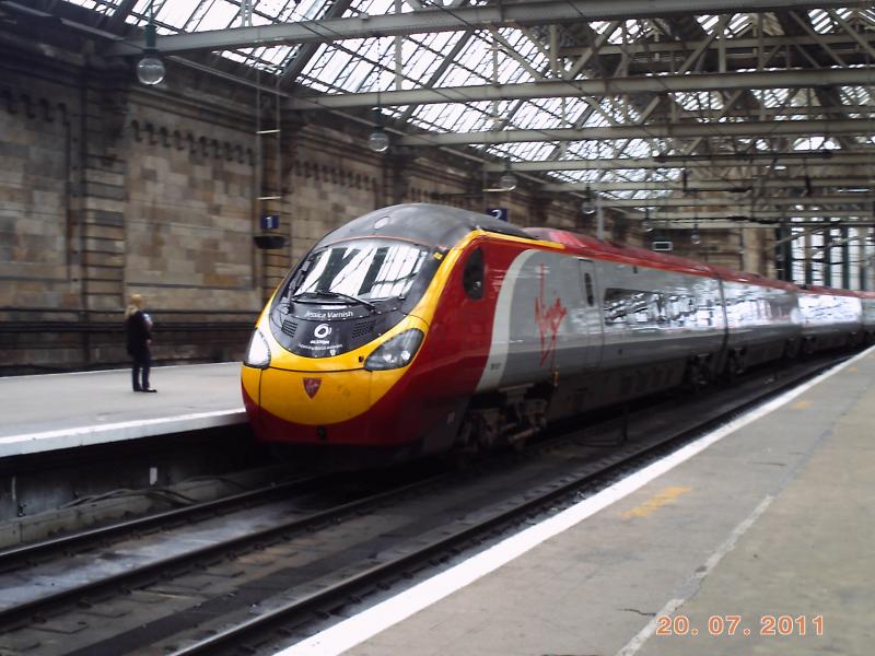 390027 in Glasgow central: 390027 with alstom logo on her nose arrives into Glasgow central. 20/7/11 Photo of 390027 in Glasgow central