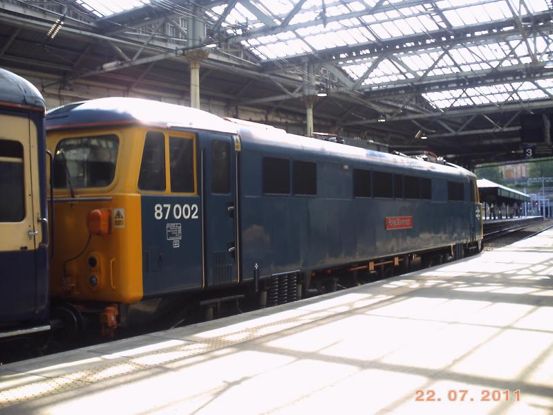 87002 in edinburgh: 87002 sits in Edinburgh waverly with a railtour.86101 on the rear.23/7/11 Photo of 87002 in edinburgh