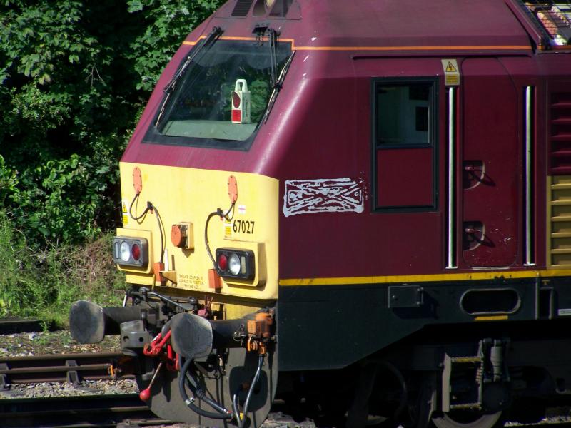 67027 at Craigentinny: weird art on the cabside of 67027. Photo of 67027 at Craigentinny