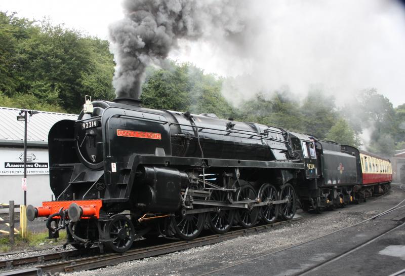 9F on the North Yorkshire Moors Railway: 9F 92214 now named COCK OF THE NORTH heads a Pickering train out of Grosmont 26/07/11. Photo of 9F on the North Yorkshire Moors Railway