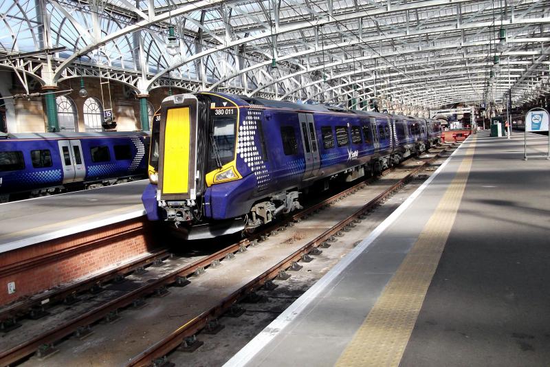 380011 at Glasgow Central: With the number of new 380s now in passenger service and a greater number of diagrams now in use. 380011 waits to leave Glasgow Central with the 1130 service to Ayr, on Tuesday 26th April 2011. Photo of 380011 at Glasgow Central