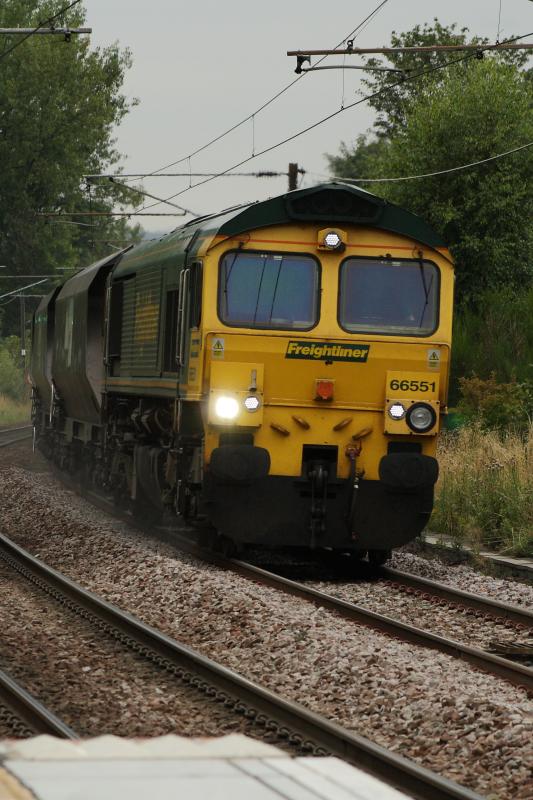 66551: 66551 passing through Johnstone on service 6E71 Hunterston to Cottam PS Photo of 66551