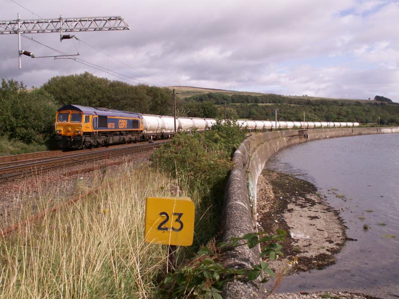 Tinfoil & Traction: The new kid on the block, 66733 waits at Craigendoran junc in its new GBRF livery on a loaded northbound 6S45 Blyth - Fort William Alcan working. Photo of Tinfoil & Traction