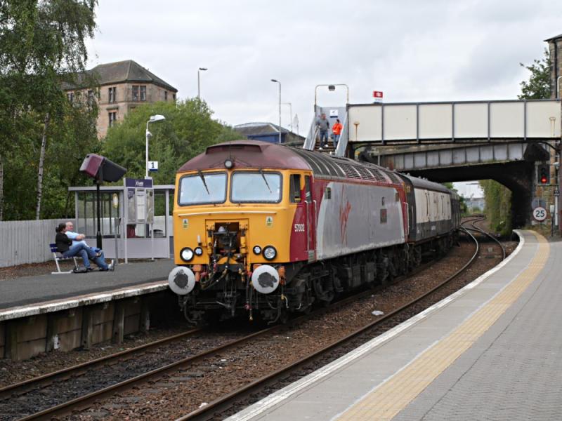 Photo of 57302 passing Springburn with an EMU turning trip