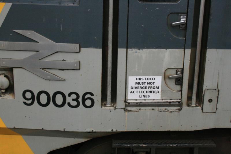 Stating the obvious: Cabside notice on the cabside of 90036, what happens when it is dragged Dit does it need permission? Is it not obvious to the driver of an AC loco. Photo of Stating the obvious